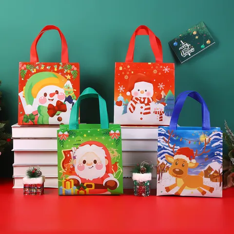 Navidad Tela No Tejida Impermeable Bolsa de Regalo Cartoon Papá Noel Muñeco de Nieve Alce Estampado Fiesta Bolsa de Embalaje