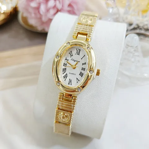 Montre Quartz Femme Baignoire Ovale de Luxe Cadran Chiffres Romains Strass Bracelet en Alliage Mode Rétro Cadeau Élégant