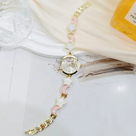 Women's Fashion Bracelet Watch Elegant Star Moon Pendant Gold Alloy Strap Quartz Watch Light Luxury Niche Ladies Jewelry Watch