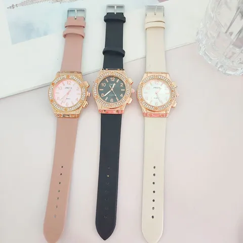 Orologio al Quarzo Unisex di Moda Lunetta con Strass Completi Cassa in Lega Orologio da Polso Analogico Rotondo Cinturino in Silicone Pelle