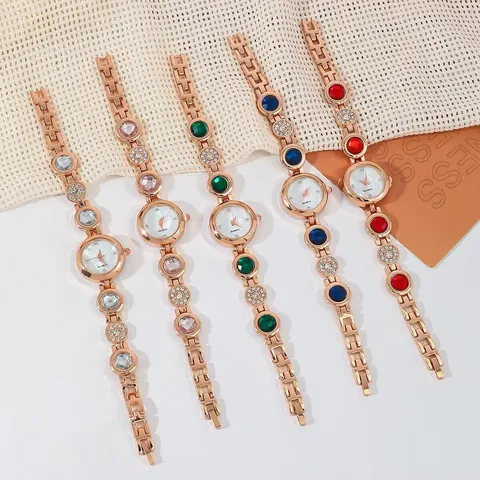 Damen Luxusmode Quarz Armbanduhr Eingelegte Strass Edelstein Legierung Metallkette Analog Schmuck Armbanduhr Für Damen