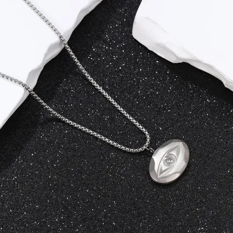 Collier Pendentif Mauvais Œil en Titane Pur pour Hommes Femmes Minimaliste Collier en Acier Titane Incrusté de Strass Bijoux Inaltérables