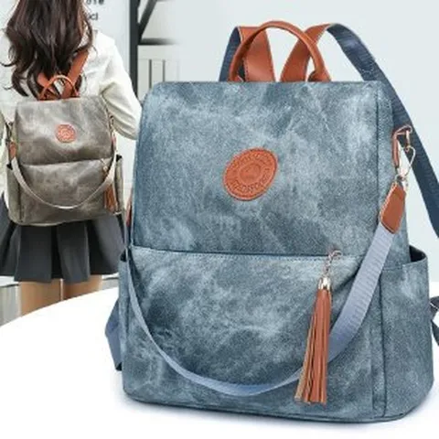 Damen Mode PU Leder Diebstahlschutz Rucksack Weich Casual Reise Rucksack Mehrzweck Schultasche Farbblock Quaste Rucksack Für Frauen