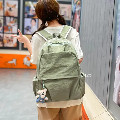 Casual Lightweight Commuter Backpack Large Capacity Nylon School Bookbag Simple Solid Color Daypack For Students
