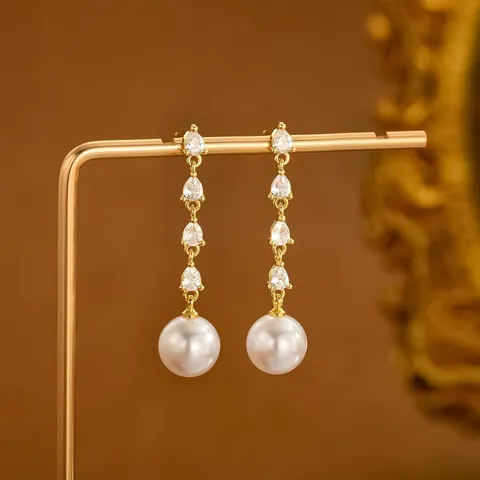Elegante Umweltfreundliche Kupfer Süßwasserperle Ohrhänger Glänzende Strass Lange Quaste Geometrische Schleife Ohrstecker Schmuck Für Damen Dating Geschenk