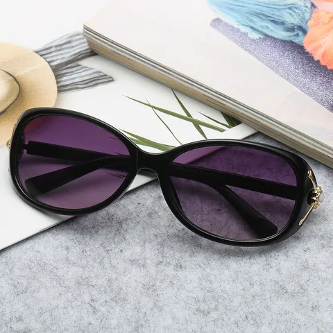 Occhiali da Sole da Donna Ovali Alla Moda Con Lenti Sfumate Montatura in PC Fiore Metallo Strass Decorazione UV400 Parasole