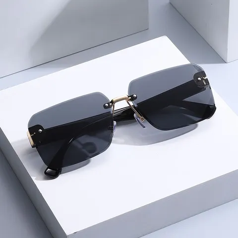 Lunettes de Soleil Carrées sans Monture pour Femmes Lentilles à Dégradé Lunettes de Soleil Oversize Protection UV Métal PC Matériau
