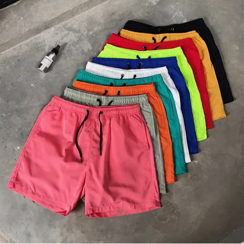 Short de Plage Homme Séchage Rapide Couleurs Acidulées Décontracté Sport Cordon de Serrage Taille Élastique Pantalon Cinq Points Bottom