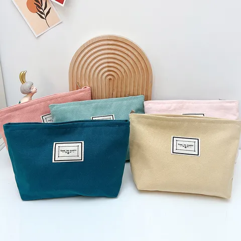Einfache Bonbonfarben Segeltuch Kosmetiktasche Tragbare Reißverschluss Make-up Aufbewahrungstasche Reise Handtasche Für Damen
