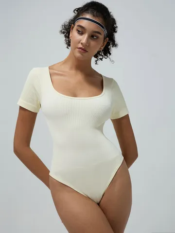 Damen Nahtloser Kurzarm Yoga Jumpsuit Einfarbig Gerippt Slim Fit Workout Body Sportbekleidung