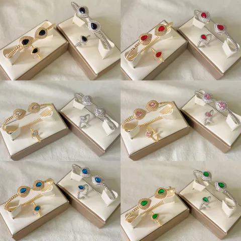 Set di Bracciale e Anello con Zirconia a Goccia Geometrica Micro-Intarsiata in Rame Placcato Oro 18K Regolabile per Donna