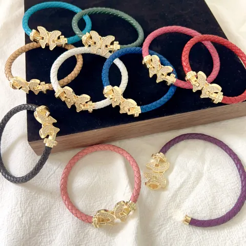 Bracciale in Corda di Pelle Intrecciata a Farfalla Donna Uomo Rame Placcato Oro Zirconia Micro Pave Charm Animale Gioielli