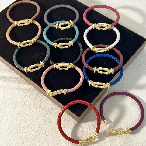 Bracciale in Pelle Intrecciata alla Moda per Donna Uomo Rame Micro Intarsiato Strass Fibbia a Ferro di Cavallo Gioielli Regalo Coppia