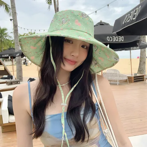 Chapeau de Pêcheur à Nœud de Dessin Animé Coréen pour Femmes Protection Solaire à Bord Large Pliable Chapeau de Plage Avec Cordon Coupe-vent