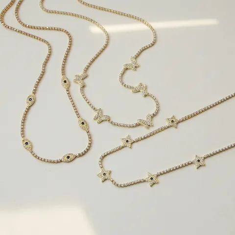 Collier Multicouche Tendance en Cuivre Strass pour Femme Choker Superposition Mauvais Œil Étoile Papillon Cœur Croix Pendentif Or Métal Bijoux Déclaration Cadeau