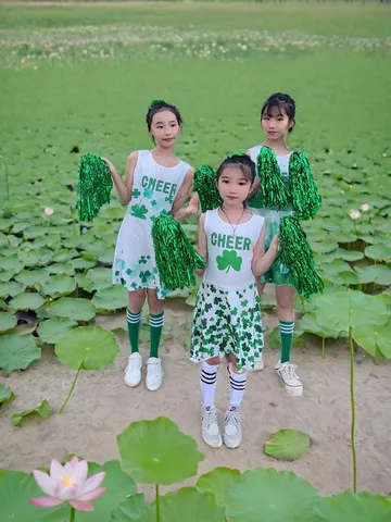Mädchen Cheerleader Uniform Ärmelloses Kleid Grünes Kleeblatt Gedruckt Sportlich Performance Outfit Team Kostüm