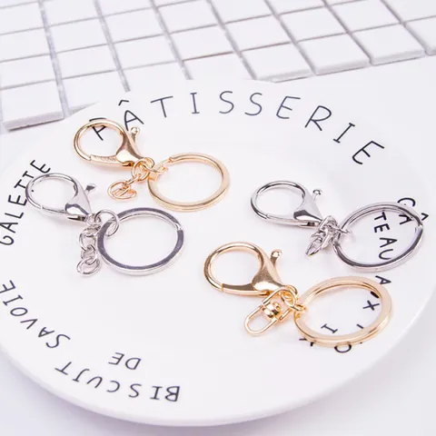 Accessoires de Porte-clés Modernes en Alliage de Zinc Fermoir Mousqueton Électroplaqué Anneau Brisé Plat Chaîne de Connexion Ensemble Fournitures Bijoux DIY Pour Clés de Voiture Sacs Unisexe