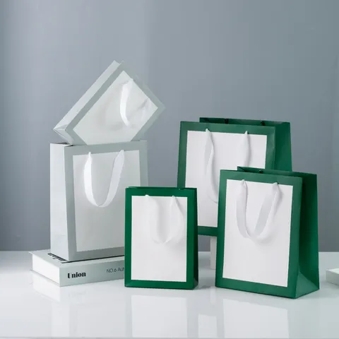 Minimalist White Cardboard Paper Gift Bag With Ribbon Handle For Clothing Beauty Boutique Packaging Portable Shopping Bag Multi Size