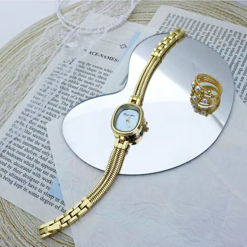 Reloj de Pulsera de Lujo para Mujer Esfera Ovalada Pequeña Reloj de Cuarzo de Aleación Elegante Correa Fina Casual Dorado