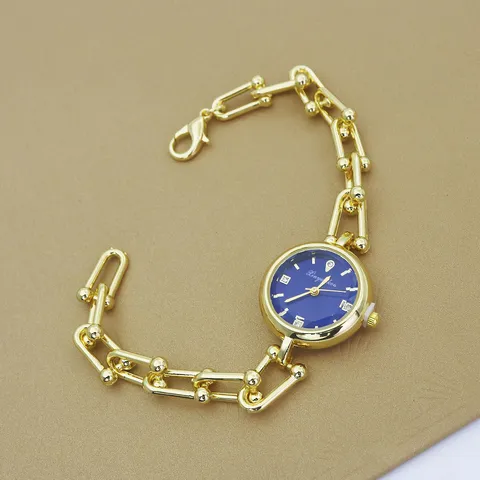Montre Bracelet Élégante pour Femme en Alliage Chaîne en U Quartz Doré Argenté Marqueurs en Strass Montre de Luxe Mode
