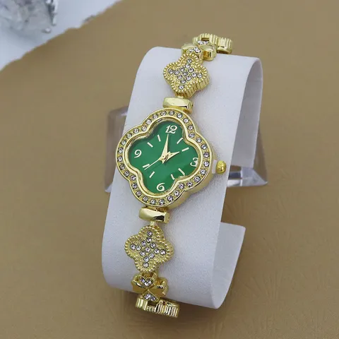 Dames Mode Strass Klavertje Vier Kwartshorloge Legering Armbandhorloge Met Bloemvormige Kast Elegante Dames Polshorloge