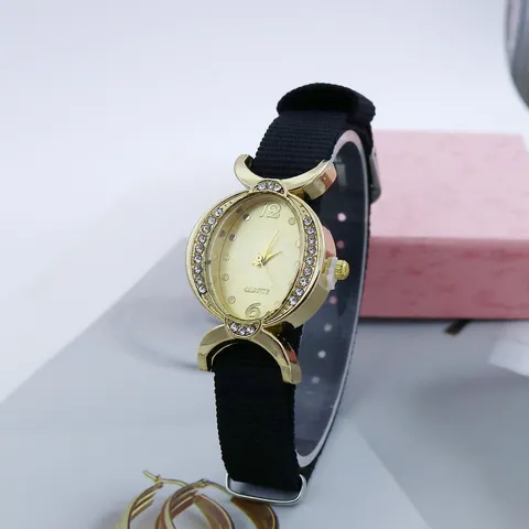 Reloj de Cuarzo para Mujer de Forma Ovalada con Diamantes de Imitación Correa de Nylon Caja de Aleación Dorada Elegante Reloj de Pulsera