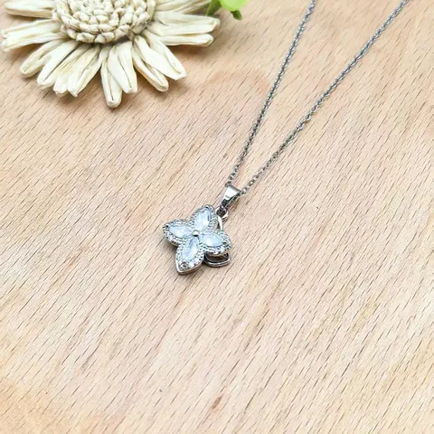 Edelstahl Vierblättriges Kleeblatt Anhänger Halskette Rotierende Blumen Strass Leichter Luxus Mode Schmuck Geschenk