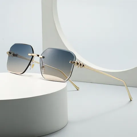 Lunettes de Soleil Carrées Sans Monture pour Femmes Luxe Or Métal Branches à Pointes Punk Verres Dégradés Mode 9838