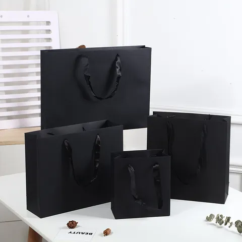 Minimalist Solid Black Gift Bag Thickened Cardboard Paper Bag With Ribbon Handle For Business Gifting Shopping Birthday Party