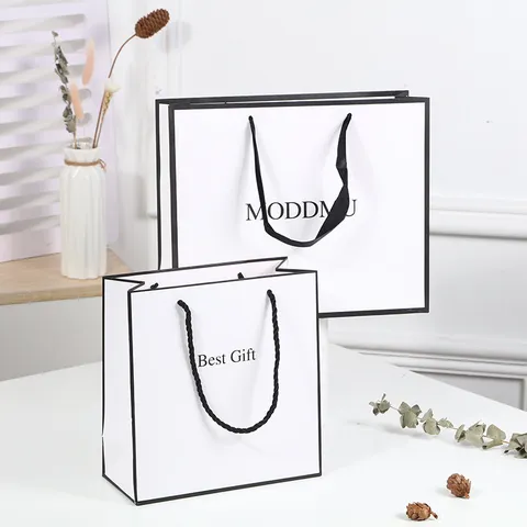 Minimalist White Paper Gift Bag Cardstock Shopping Bag With Black Handles For Retail Packaging And Party Favors