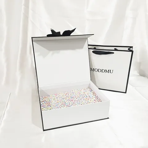 Minimalist Black And White Flip Gift Box Cosmetic Skincare Packaging Box With Ribbon Bowknot And Gift Bag