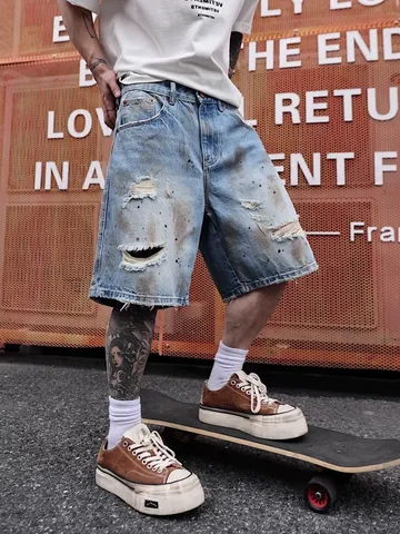 Short en Jean Vieilli pour Hommes avec Déchirures Taches de Peinture Hip Hop Streetwear Coton Coupe Large Sous le Genou