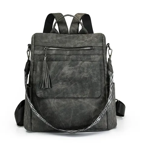 Sac à Dos de Voyage Scolaire Antivol en Cuir PU Décontracté Mode pour Femmes Avec Pendentif Pompon Couleur Unie Multi-Poches