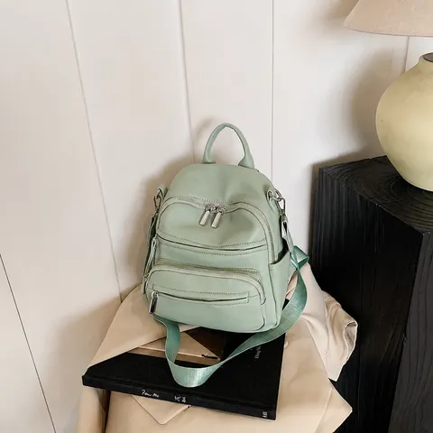 Sac à Dos Décontracté en Cuir PU pour Femmes Mode Couleur Unie Grande Capacité Voyage École Sac avec Poches Multiples