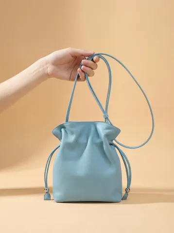 Bolso Balde Mini Cloud de Cuero de Vaca de Primera Capa para Mujer Casual Color Sólido Cordón Bandolera
