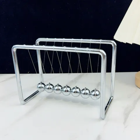 Todo Metal Siete Bolas Newton Cuna Balance Bolas Escritorio Decoración Lujo Adornos Ciencia Péndulo Juguete Para Casa Oficina