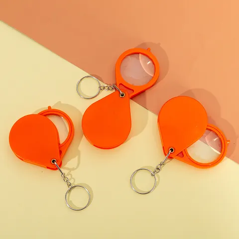 Portachiavi Lente d'Ingrandimento Pieghevole Portatile Mini Lente Tasca Anello Metallo Plastica Lettura Regalo
