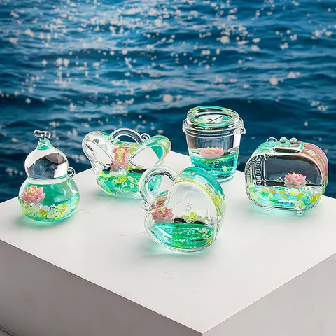 Porte-clés en Acrylique Transparent Liquide Sable Mouvant Mignon Lotus Huile Flottante Sac Pendentif Anneau Décoratif Cadeau Pour Femmes