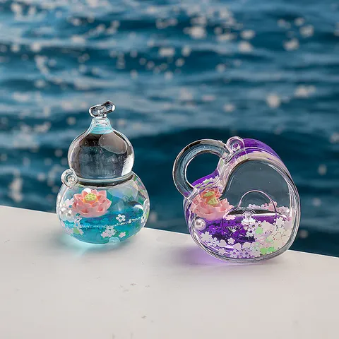 Mignon Acrylique Liquide Sable Mouvant Porte-clés Transparent Lotus Poupée Flottant Huile Sac Pendentif Porte-clés Cadeau