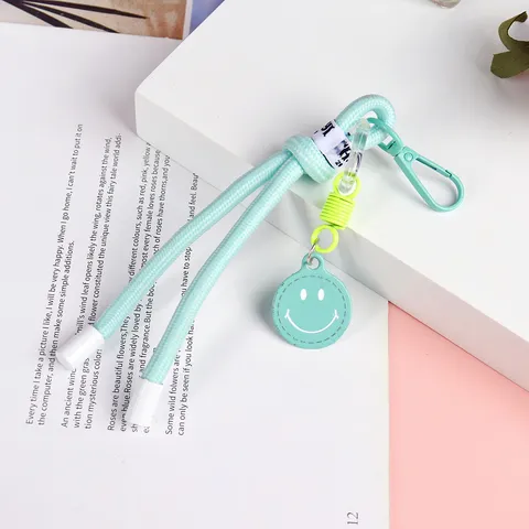 Lanière de Porte-clés Courte Tressée Colorée Pendentif Visage Souriant Dragonne Téléphone Joli Accessoire de Charme de Fermeture Éclair de Sac