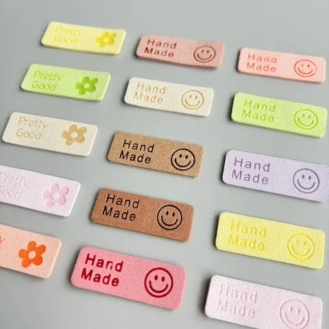 Handmade PU Leather Labels For Sewing DIY Crafts Cute Smile Face And Floral Embossed Tags Clothing Hats Bags Accessories