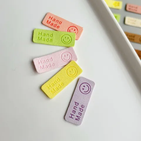 Handmade PU Leather Labels For Sewing DIY Crafts Cute Smile Face And Floral Embossed Tags Clothing Hats Bags Accessories