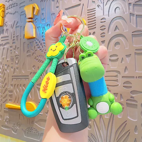Creative Fruit Stretch Dinosaur Keychain PVC Cartoon Bag Pendant For Women Kids Backpack Accessories Cute Animal Gift