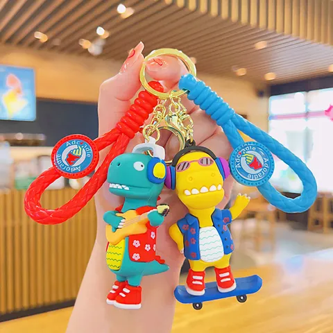 Schattige Cartoon Dinosaurier Schlüsselanhänger PVC Zacht Rubber Skateboard Gitaar Dino Tas Hanger Sleutelhanger Voor Rugzak Decoratie