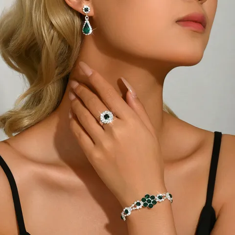 Eleganter Kupfer Strass Blumen Schmuckset Vintage Geometrische Wassertropfen Ohrringe Armband Ring Kombi Für Damen Tägliche Party Zubehör