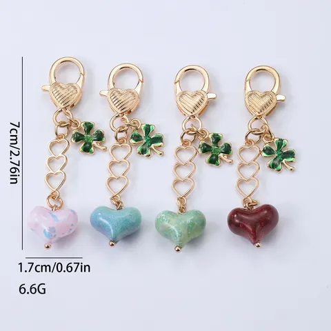Creative Hollow Alloy Heart Bag Pendant Clover Keychain 3D Heart Lucky Grass Key Ring Phone Accessory Jewelry For Women