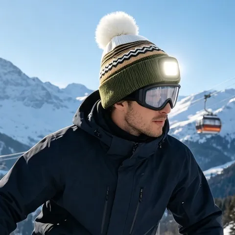 Unisex Inverno Caldo Maglia Beanie Cappello LED Ricaricabile Faro Pom Pom Onda Striscia Cuff Cappello Esterno Notte Illuminazione Berretto