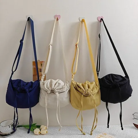 Unisex Street Fashion Nylon Crossbody Bag Large Capacity Drawstring Dumpling Bag Hong Kong Style Casual Travel Messenger Bag