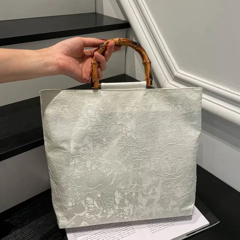 Bolso de Mano de Estilo Neo-Chino con Asa de Bambú para Mujer Vintage Tela Jacquard Borla Banquete Bolso Zen Floral Noche
