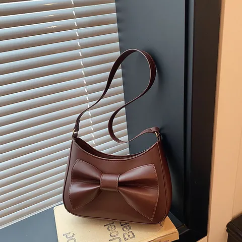 Damen Mode PU Leder Unterarm Umhängetasche Süße Schleife Einfarbig Casual Tägliche Pendler Chic Handtasche